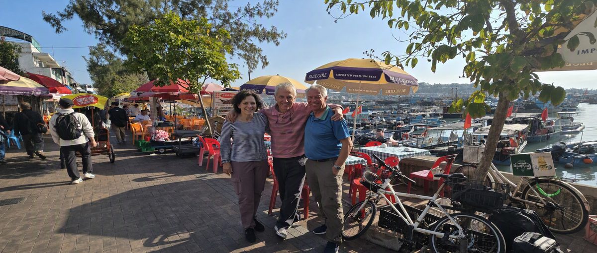 Hans with guests on the Cheung Chau harbourfront