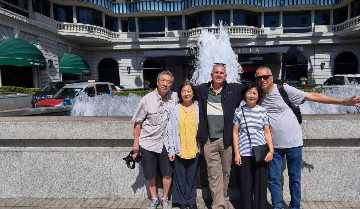 Hans with guests at The Peninsula Hong Kong fountain